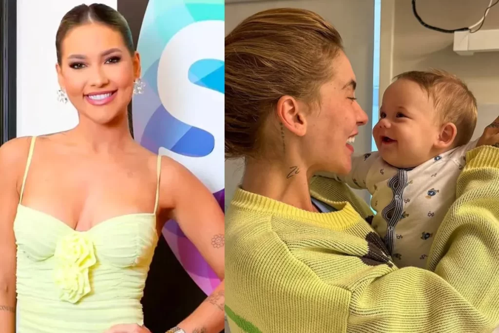 Virginia Fonseca com cabelo preso e suéter amarelo abraçando o filho José Leonardo em um quarto de hospital.